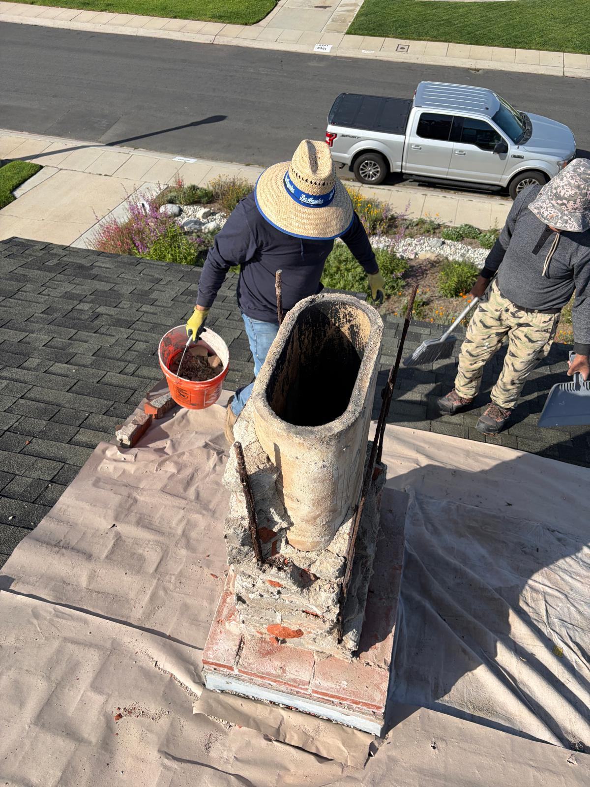 Chimney demolished down to the flue liner during rebuild